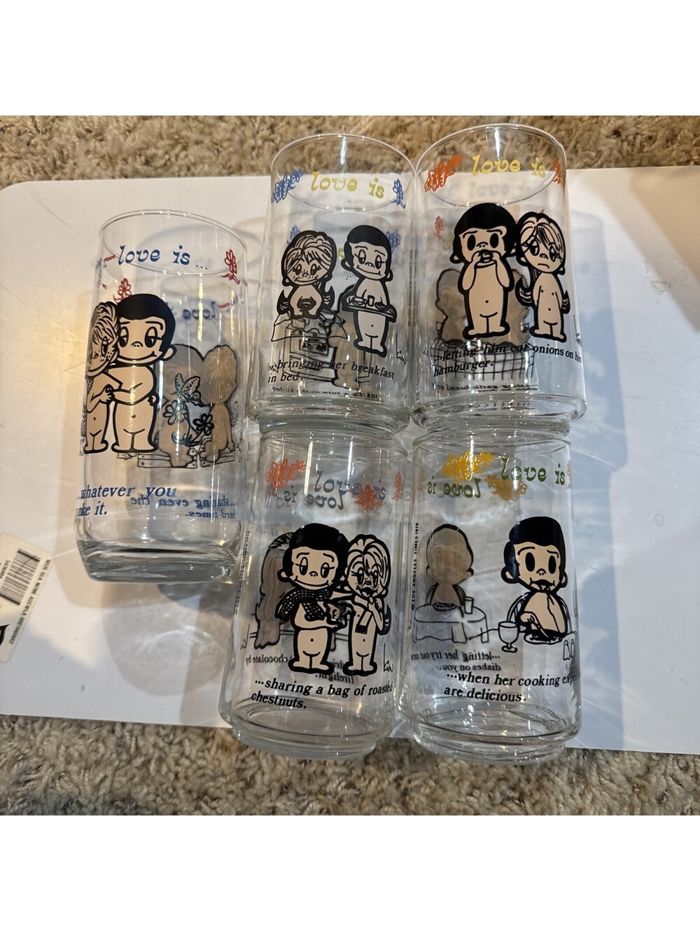 Set of 5 vintage 1970s "Love Is..." comic strip drinking glasses  never used.